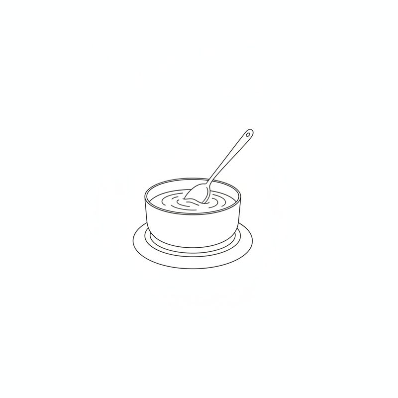 Line drawing of a small saucepan on a hob with a spoon stirring a smooth liquid