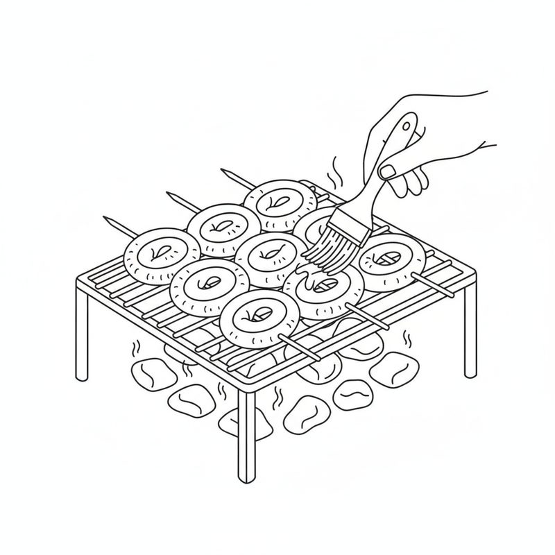 Line drawing of coiled skewers arranged on a grill grate over coals, with a hand brushing sauce over them.