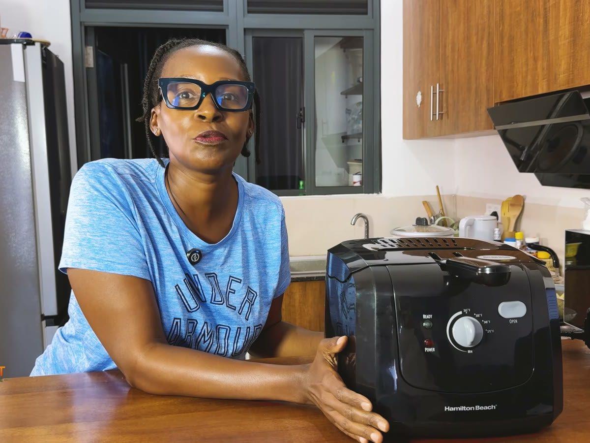 Jackie from The Smart Kitchen Guide with the Hamilton Beach 35021 Cool Touch deep fryer on her kitchen counter