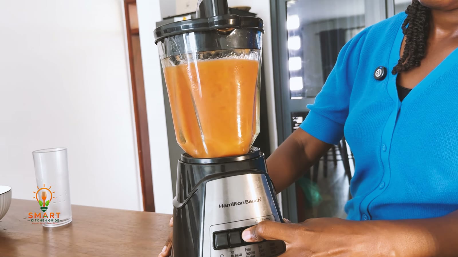 A smooth watermelon and mango smoothie blended in the Hamilton Beach 58148A glass jar