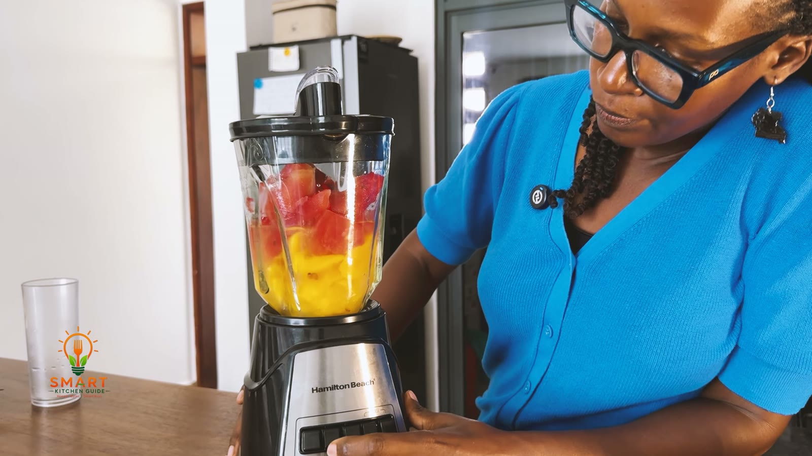 Frozen watermelon and mango in the Hamilton Beach Power Elite 58148A before blending