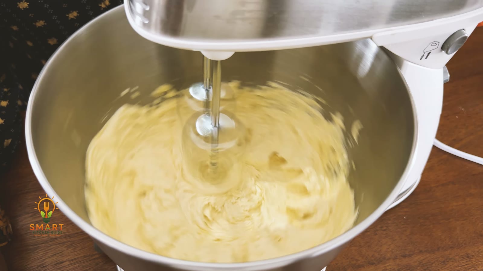 Close-up of smooth cookie dough being mixed by the Hamilton Beach 64655 beaters
