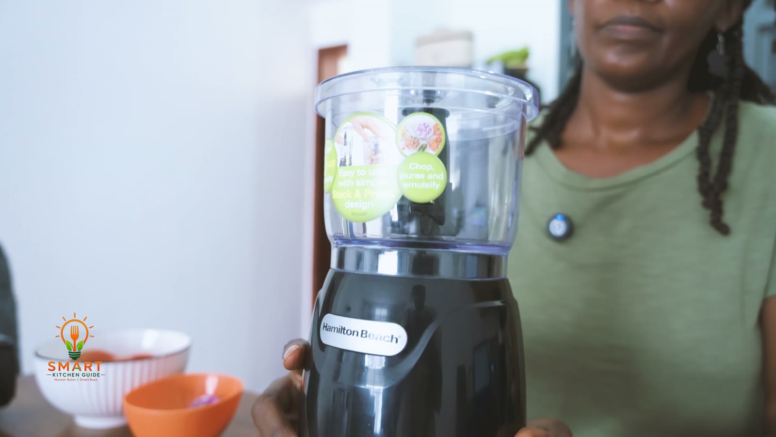 The Hamilton Beach Stack & Press 72850 chopper with its clear 3-cup bowl on the black motor base