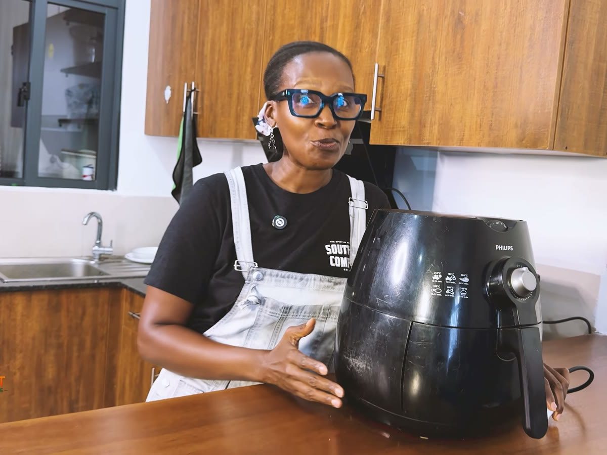 Jackie from The Smart Kitchen Guide with the Philips Airfryer HD9220 on her kitchen counter