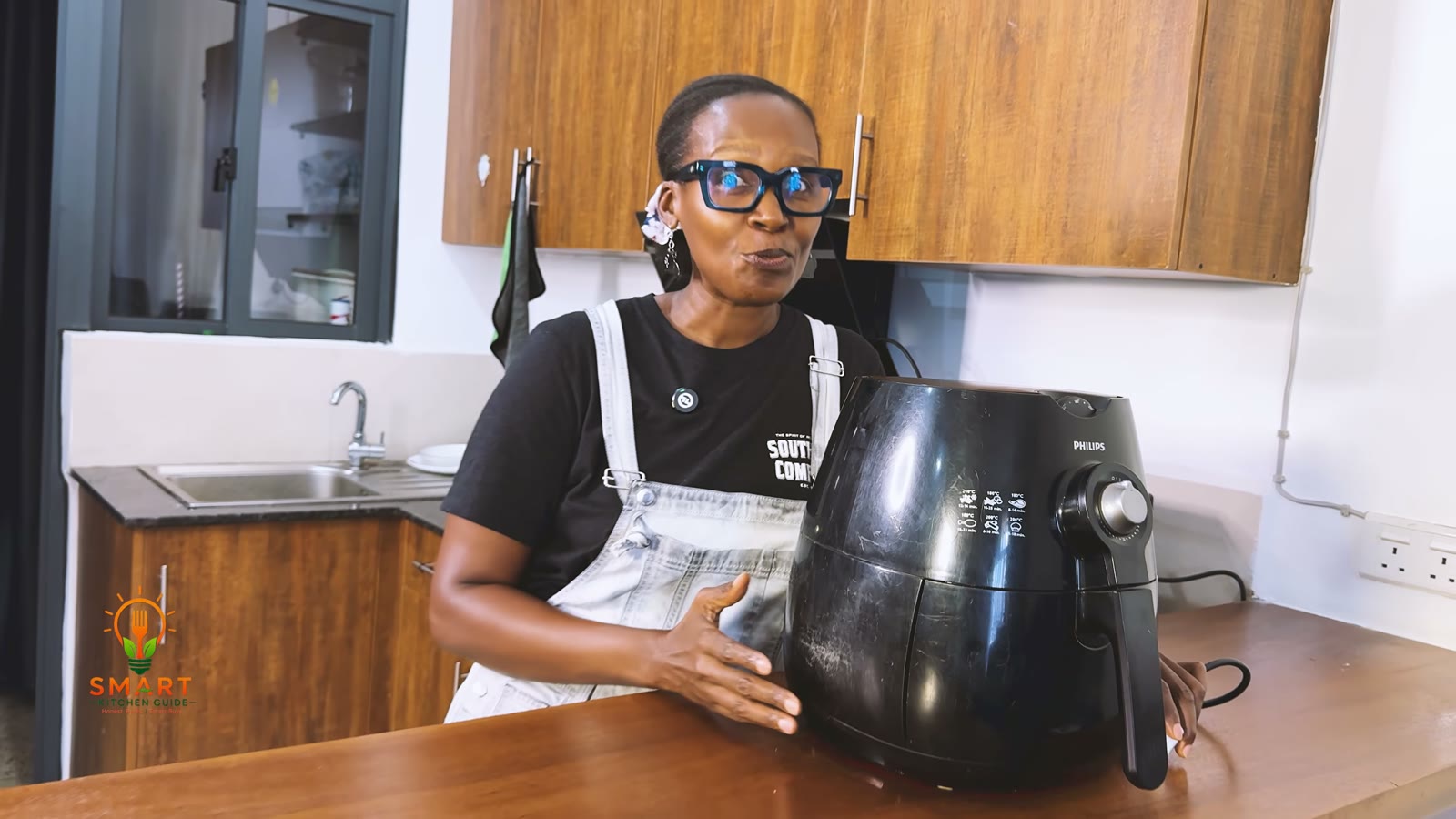 Jackie from The Smart Kitchen Guide with the Philips Airfryer HD9220 on her kitchen counter