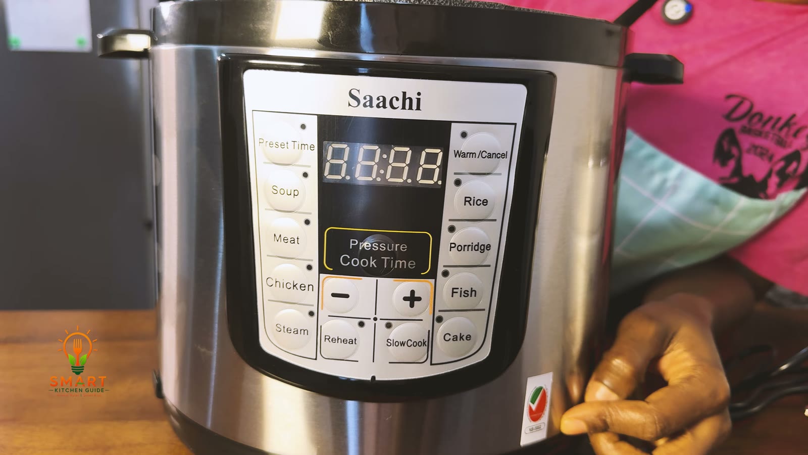 Control panel of the Saachi NL-PC-5306 with Soup, Meat, Chicken, Steam, Rice, Porridge, Fish, Cake, Reheat and SlowCook buttons